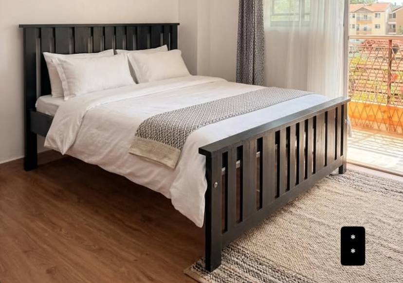 Solid Wood Raised-Panel Bed Frame with High Headboard & Low Footboard